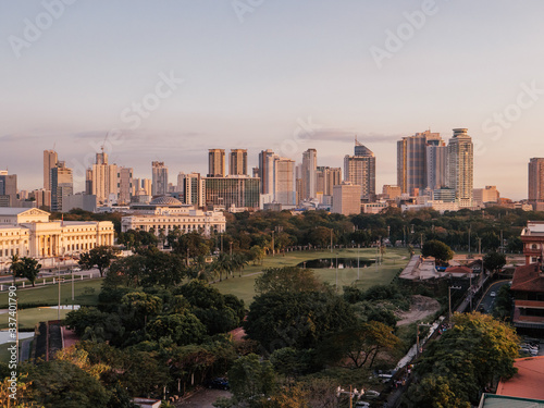Intramuros Golf Club with the Skyline of Manila in the background