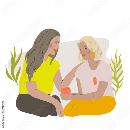Women friends supporting each other and drinking tea or coffee