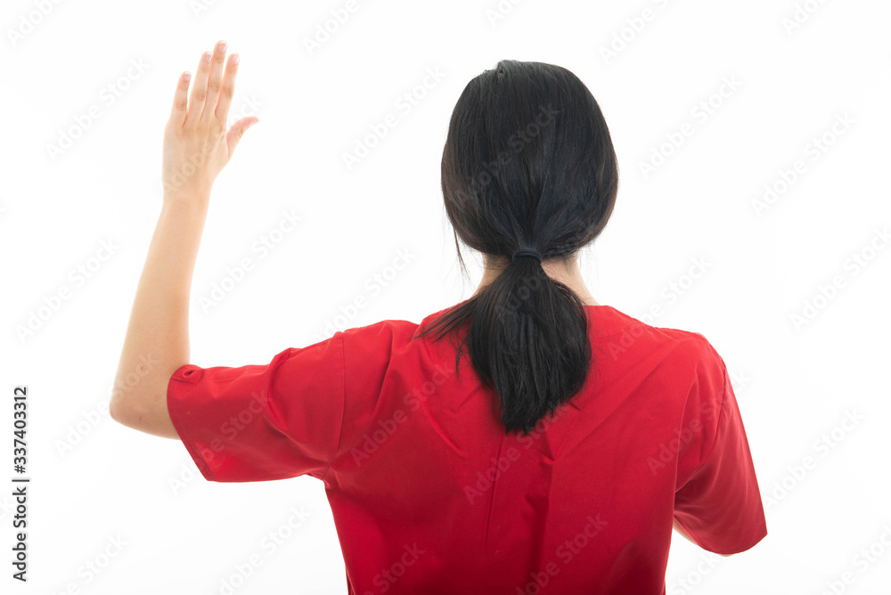 Back view of young attractive female nurse taking oath Back view of young attractive female nurse taking oath
