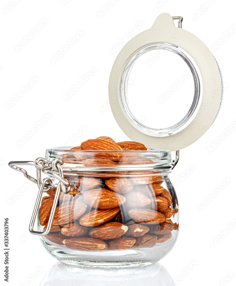 Φωτογραφία Almond nuts in a open transparent glass jar with rubber seal and metal clamp on