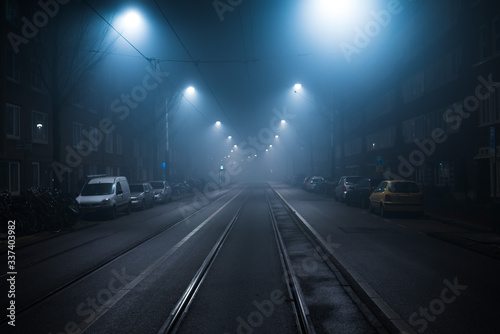 Misty view of tram lines in Bos En Lommer Amsterdam