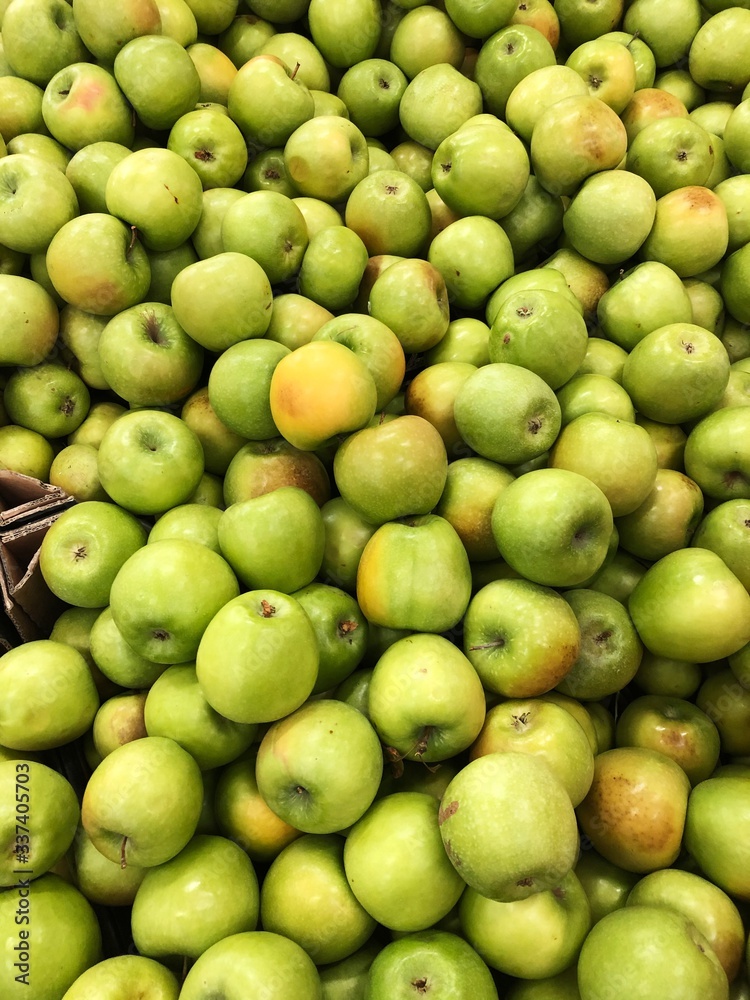 Delicious fresh green apples on the market