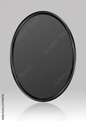 black oval plate on gray glossy background