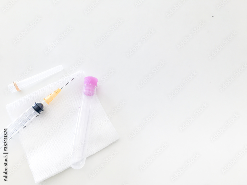 blood collection tube and syringe  with gauze in healthcare check uo concept with copy space