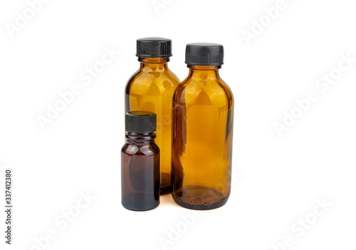 The brown glass bottle isoleted on white background is used for cosmetic skin care product  containing products and medical supplies.clipping path