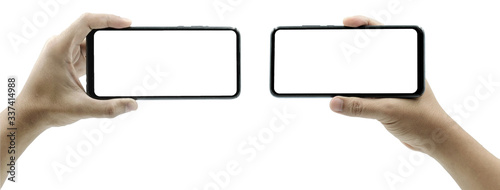 Set of female hand holding the black smartphone iphone with blank screen and modern frameless design in two rotated perspective positions - isolated on white background - Clipping Path.