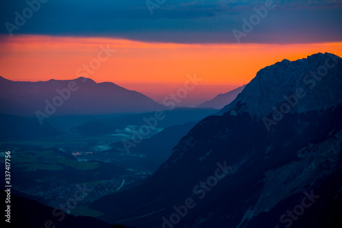 Valley seen from the summit of a mountain shortly before sunrise
