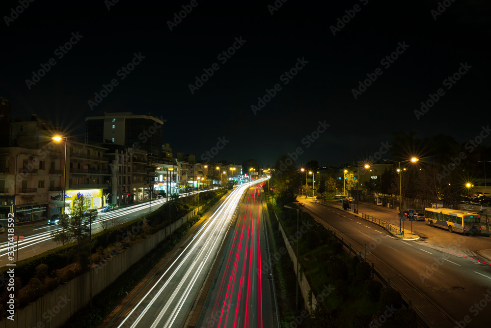 Athens/Katehaki/Greece/03/13/2019:Light trails of car passing by the bridge at kethaki metro station