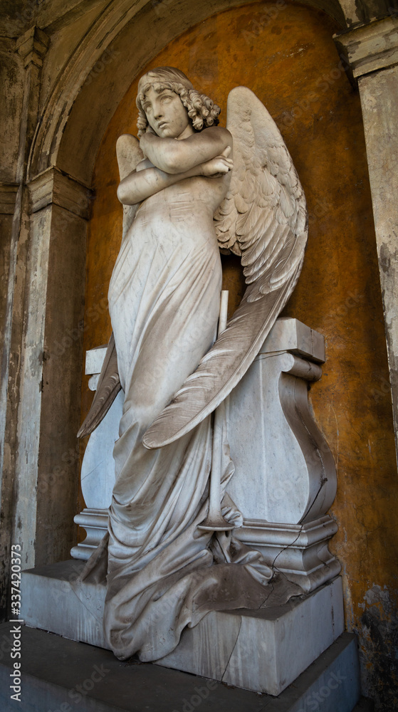 The Angel of the Resurrection, sculpted by Giulio Monteverde. 19th century funerary art. The face has an incredible intensity. Large wings surround the body. Cemetery of Verano, Rome, Italy.
