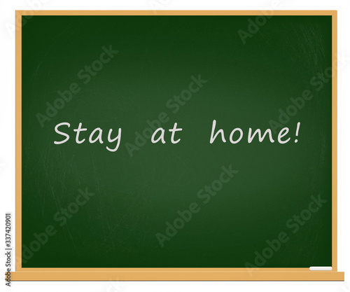 The inscription on a school blackboard "stay at home". Quarantine. Coronavirus