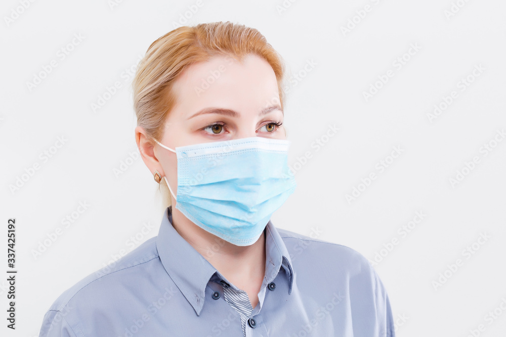 Businesswoman with protecting mask on her lips Businesswoman with protecting mask on her lips