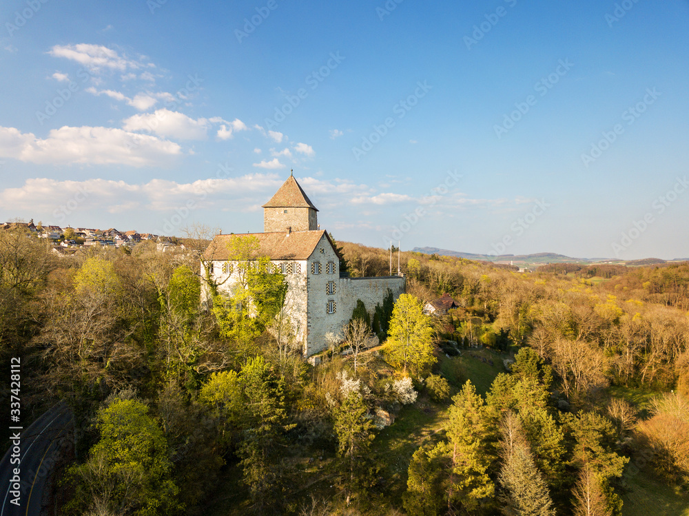 Schaffhausen, Switzerland - April 08. 2020: Aerial image of the medieval castle Herblingen in Schaffhausen, Switzerland, It is a Swiss heritage site of national significance.