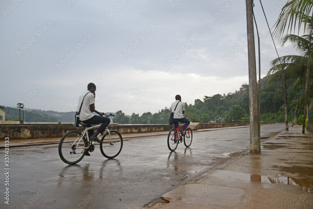 African Boy Cycling in West Africa