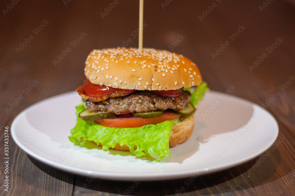 hamburger on a wooden background hamburger on a wooden background