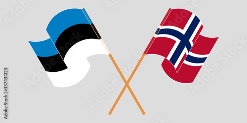 Crossed and waving flags of Estonia and Norway