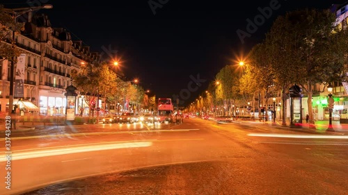 Time lapse: Traffic on the Champs Elysees in Paris, evening time photo