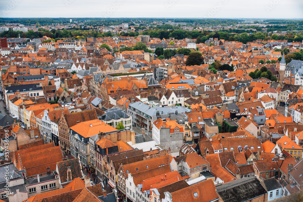 Panoramic view from the Belfort tower on the historic part of Bruges and the Cathedral of St. Salvator, the main pedestrian street with many shops, Belgium. Travel to Belgium.