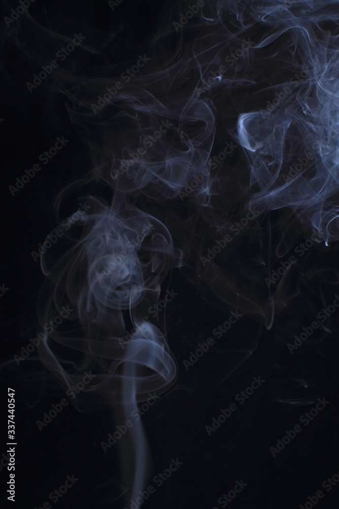 Fototapeta premium Abstract white smoke texture on black background