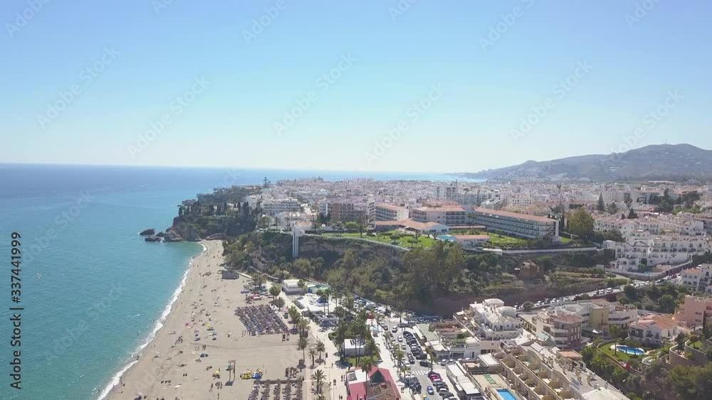 Aerial view of Nerja-Burriana beach Costa del Sol Spain. Famous beach in costa del sol, on backgroundview of Aerial view of Nerja-Burriana beach Costa del Sol Spain. Famous beach in costa del sol, on backgroundview of