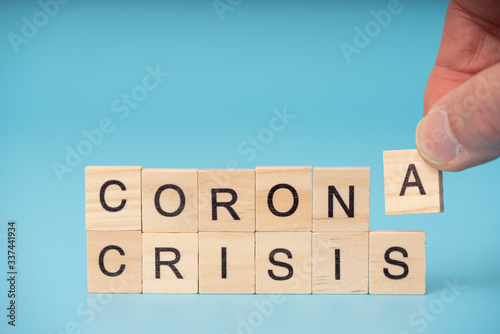 Corona Virus infection concept. Letter of wooden blocks