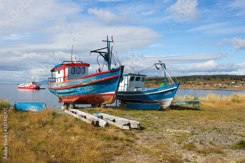 Punta Arenas, Chile, Fishing boats on the shore.  Fishing has long been the main occupation of Patagonia. © galina_savina