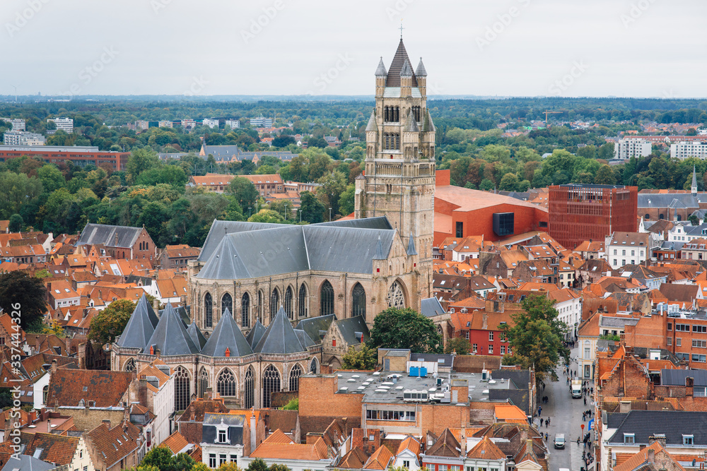 Panoramic view from the Belfort tower on the historic part of Bruges and the Cathedral of St. Salvator, the main pedestrian street with many shops, Belgium. Travel to Belgium. Panoramic view from the Belfort tower on the historic part of Bruges and the Cathedral of St. Salvator, the main pedestrian street with many shops, Belgium. Travel to Belgium.