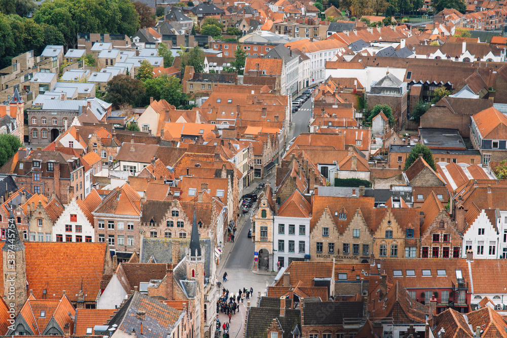 Panoramic view from the Belfort tower on the historic part of Bruges and the Cathedral of St. Salvator, the main pedestrian street with many shops, Belgium. Travel to Belgium. Panoramic view from the Belfort tower on the historic part of Bruges and the Cathedral of St. Salvator, the main pedestrian street with many shops, Belgium. Travel to Belgium.