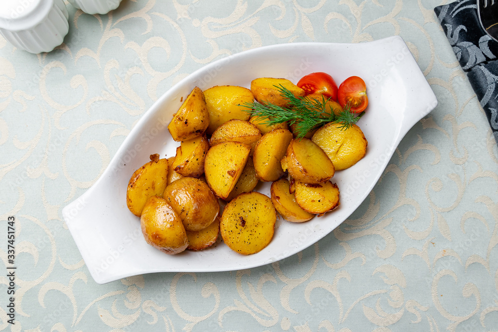 baked mini potatoes on white plate