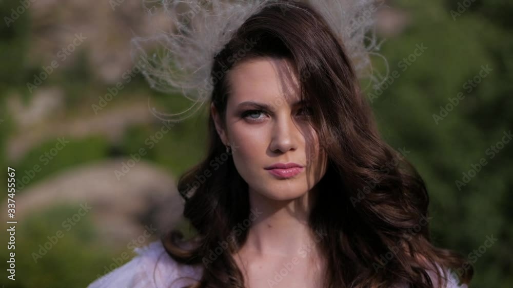 Close up portrait of pretty brunette girl posing outdoors enjoying summer. Close up portrait of pretty brunette girl posing outdoors enjoying summer.
