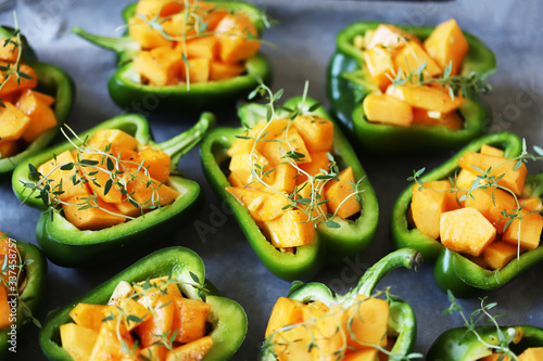 Green peppers stuffed with pumpkin. Vegan food. Healthly food. Cooking healthy food at home.