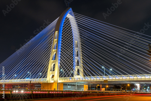 Nightscape of new landmark Konan Ai-Qin Bridge in Taichung City, Taichung Central Park at the Xitun District Shuinan Economic and Trade Area. The second largest park in Taiwan photo