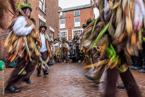 Obraz na płótnie morris dancers in creative blur, nantwich, cheshire