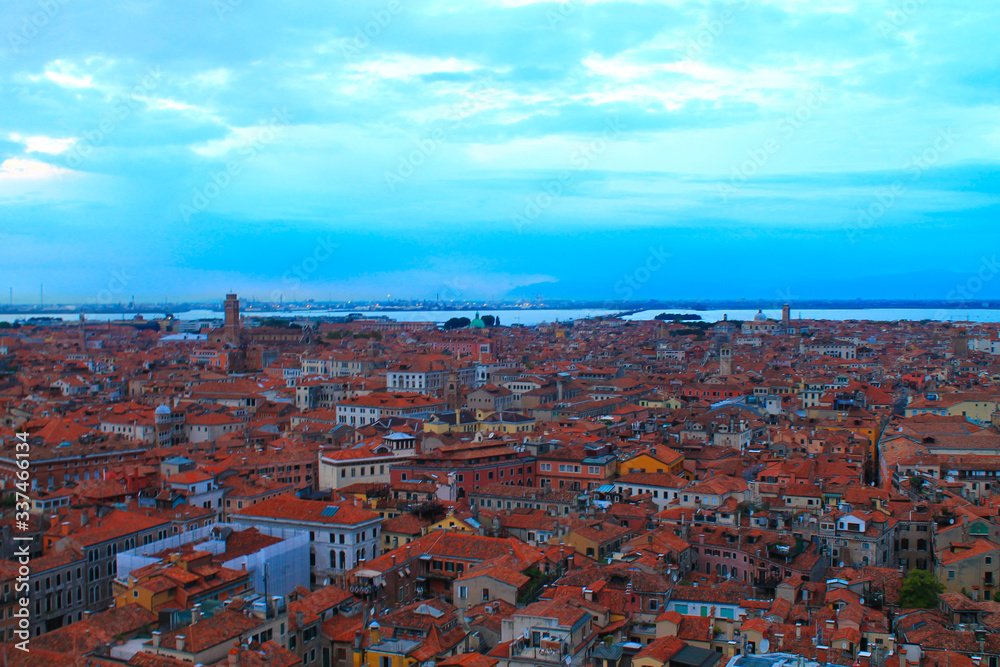 Cityscape of Venice. Roofs of the old city from a height. Venice from above. Sunset in Venice. Italy