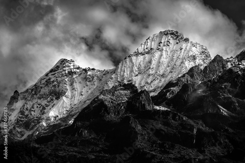 a beautiful mountain view with fog and clouds