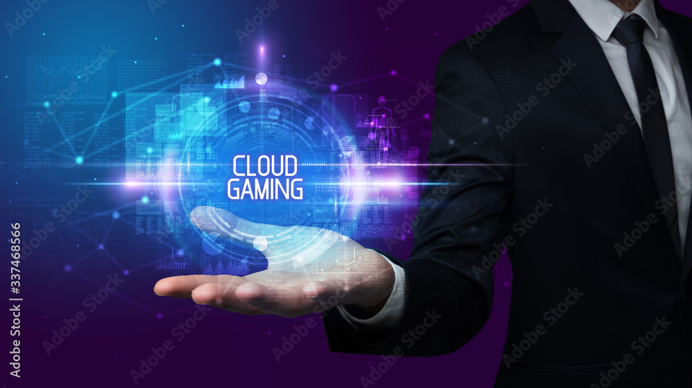 Man hand holding CLOUD GAMING inscription, technology concept