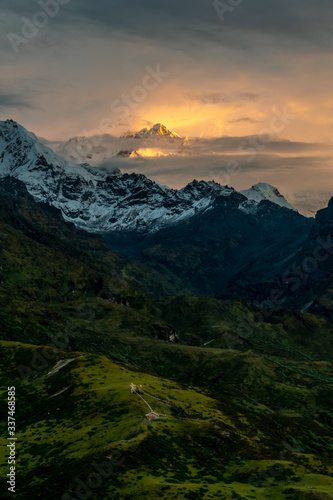 a beautiful mountain view with fog and clouds