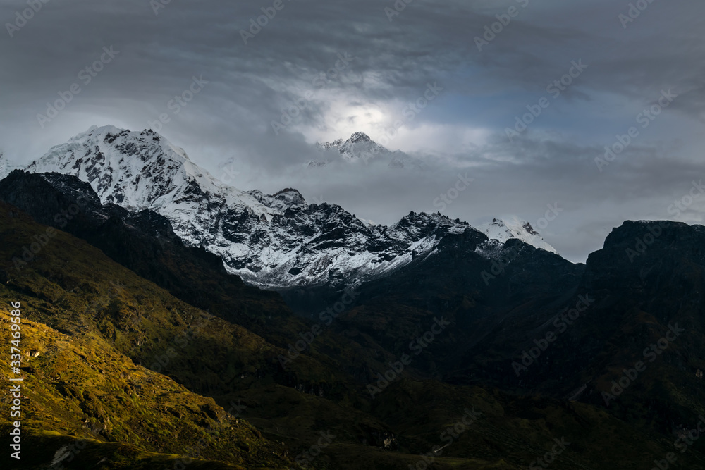 a beautiful mountain view with fog and clouds