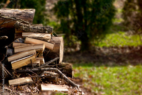 Stack of firewood and blurred background