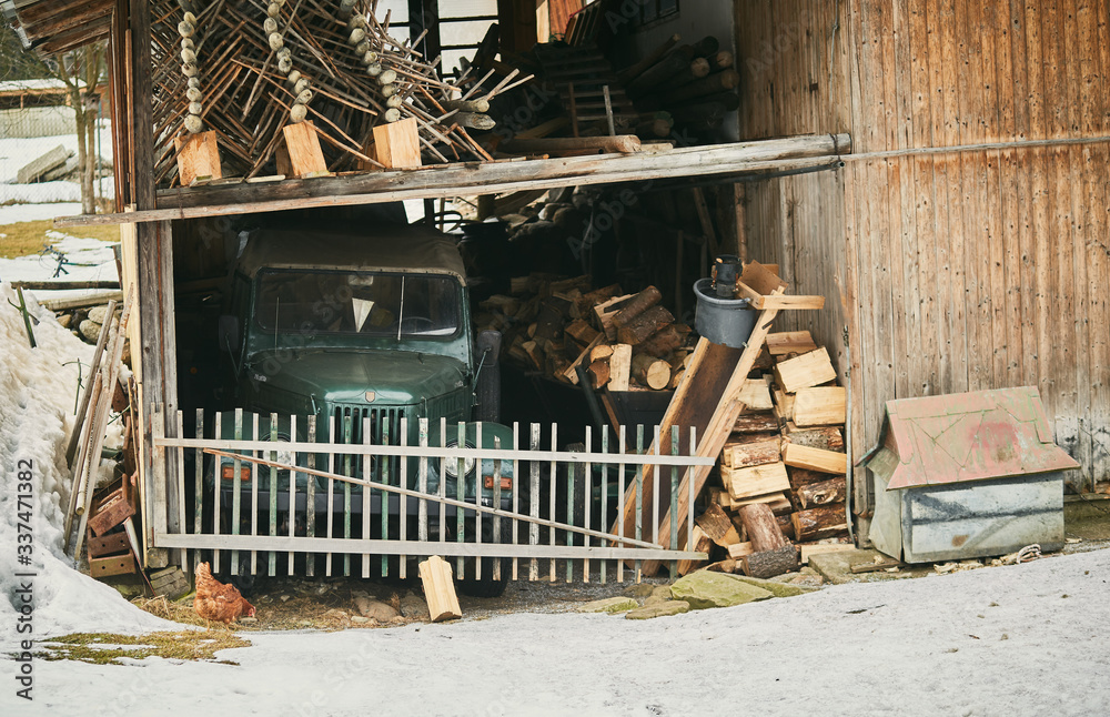 abandoned old retro car in wooden barn building abandoned old retro car in wooden barn building