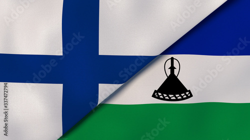 The flags of Finland and Lesotho. News, reportage, business background. 3d illustration photo