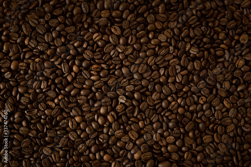 background of evenly scattered coffee beans