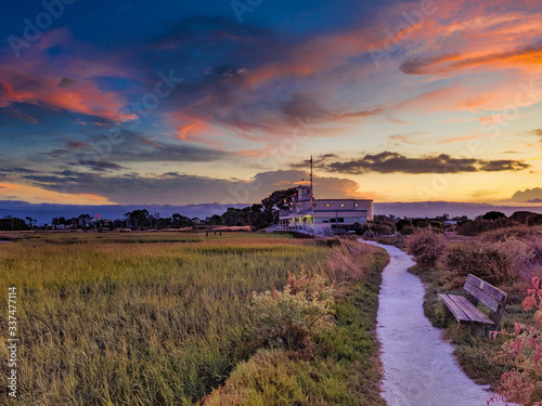 Eco Center building under a colorful sunset in the San Francisco baylands photo