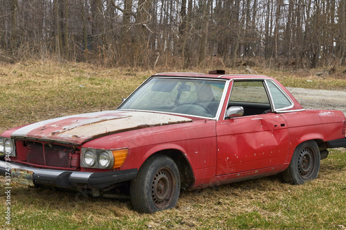 rusted red car