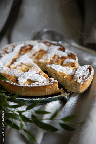 Preparation of Easter cake, also called Pastiera Napoli, typical homemade dessert, with eggs, flour, sugar and vanilla, wheat and colored sugared almonds
