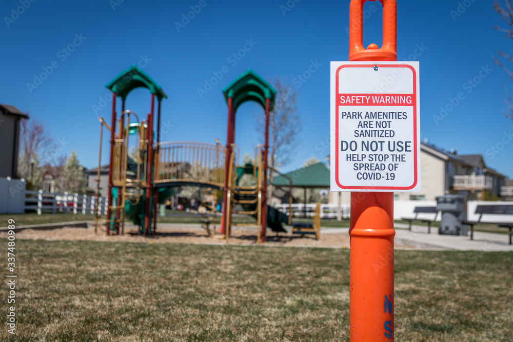 Sign at Playground Closed by Coronavirus Sign at Playground Closed by Coronavirus