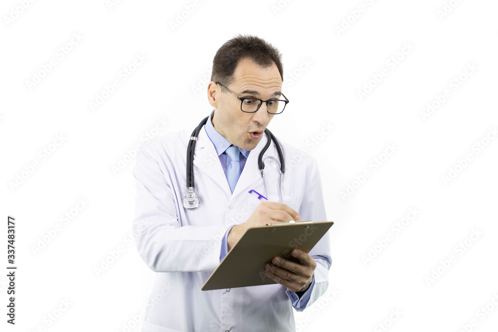 Surprised male senior age doctor in medical uniform and stethoscope checking patient's medical record on clipboard on isolated white background. Copy space. Medical report, history, diagnosis concept Surprised male senior age doctor in medical uniform and stethoscope checking patient's medical record on clipboard on isolated white background. Copy space. Medical report, history, diagnosis concept