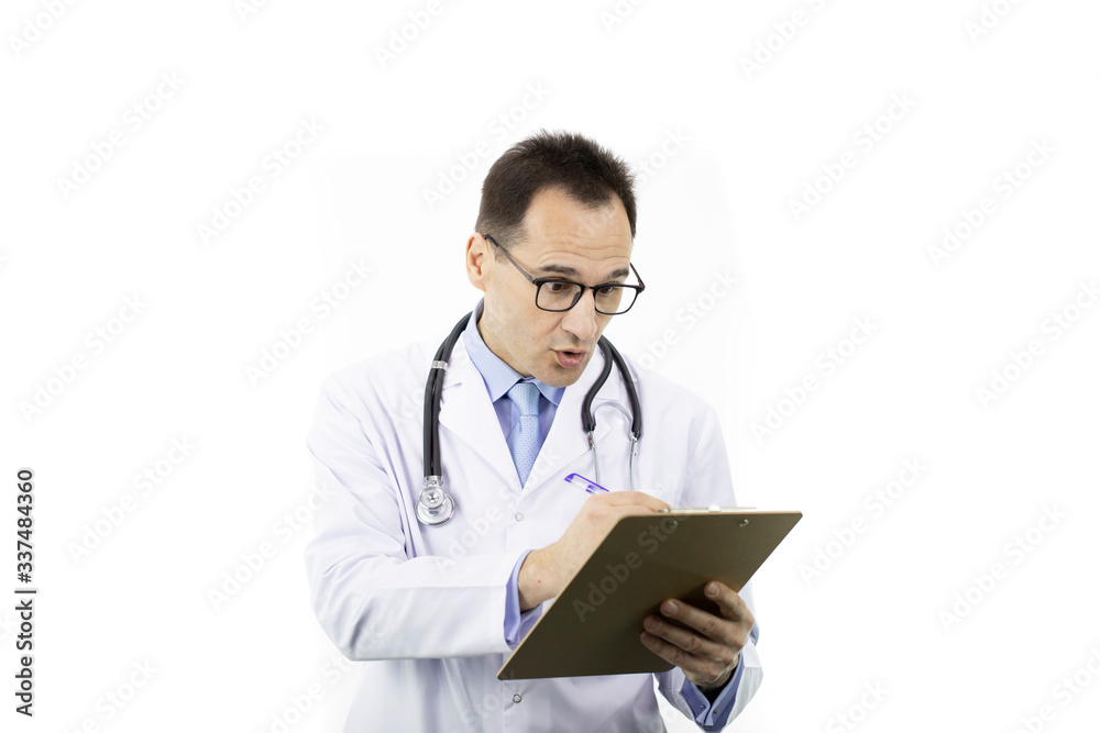Surprised male senior age doctor in medical uniform and stethoscope filling medical form on clipboard on isolated white background. Copy space. Medical report, history, diagnosis concept Surprised male senior age doctor in medical uniform and stethoscope filling medical form on clipboard on isolated white background. Copy space. Medical report, history, diagnosis concept