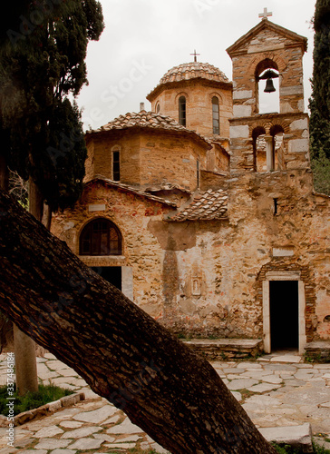 Ruins of ancient monastery of Kesariani in mountains near Athens, Greece photo