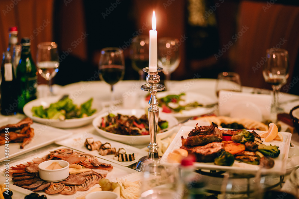 A dining table with tasty food in restaurant