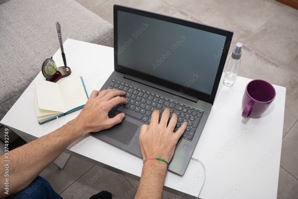 Man working in home office format during quarantine Man working in home office format during quarantine